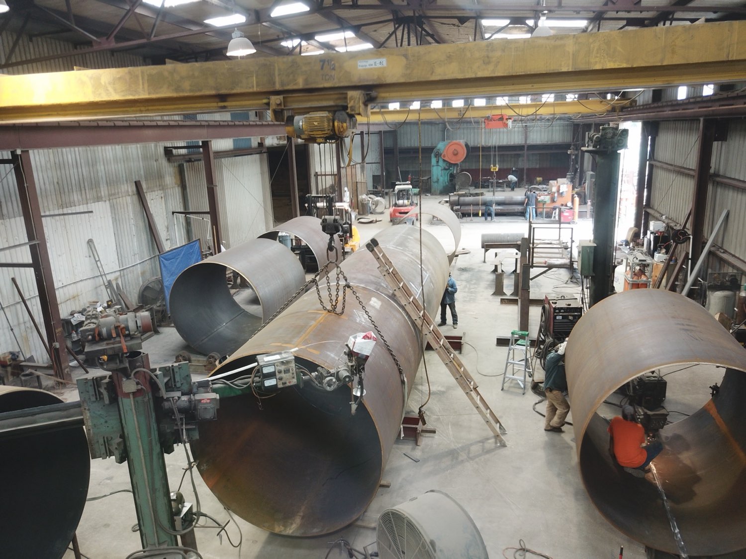 Shells and cones under the overhead cranes in the Texas Plate Fabricators shop